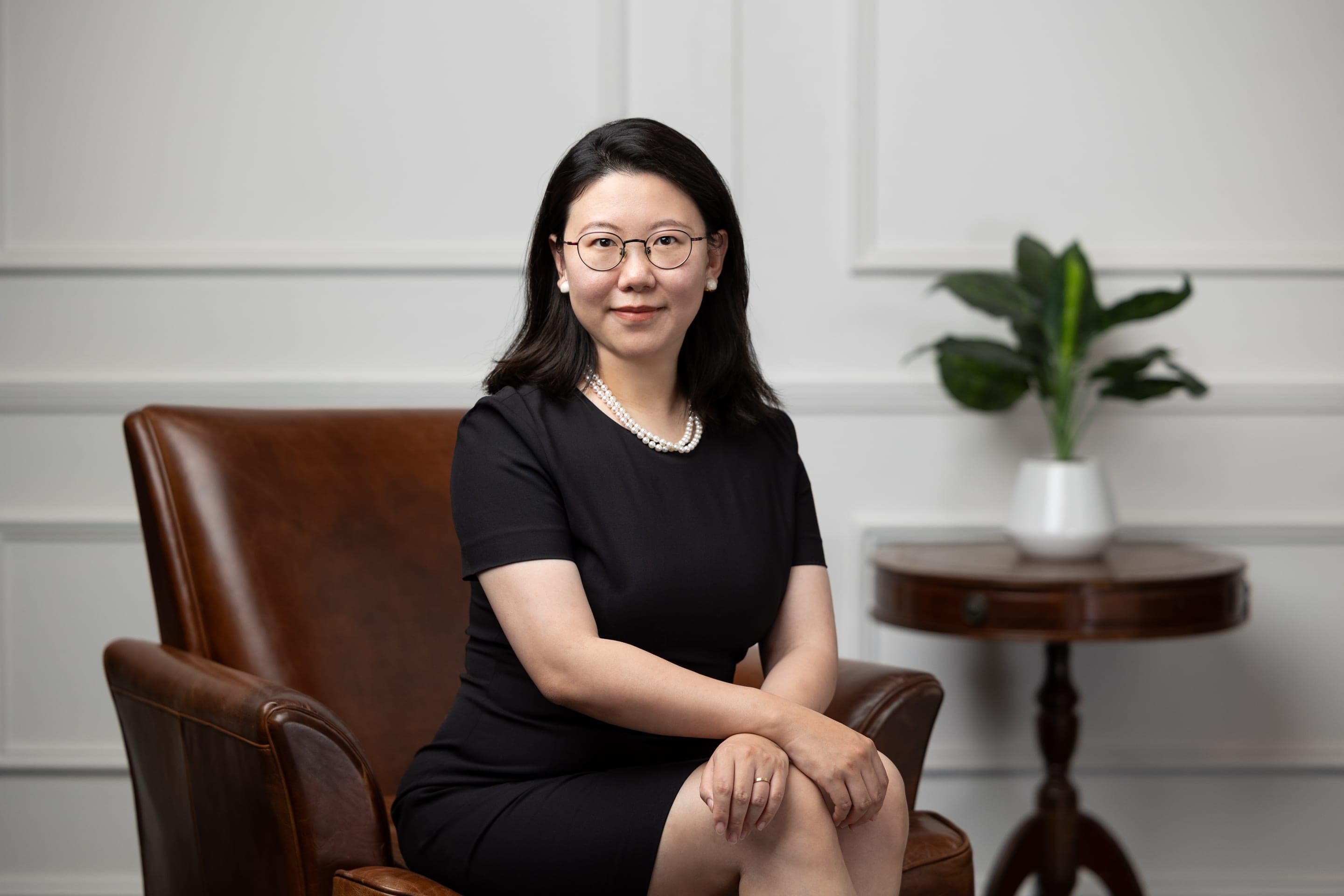 Gloria Zhao, family law solicitor, in her Sydney office